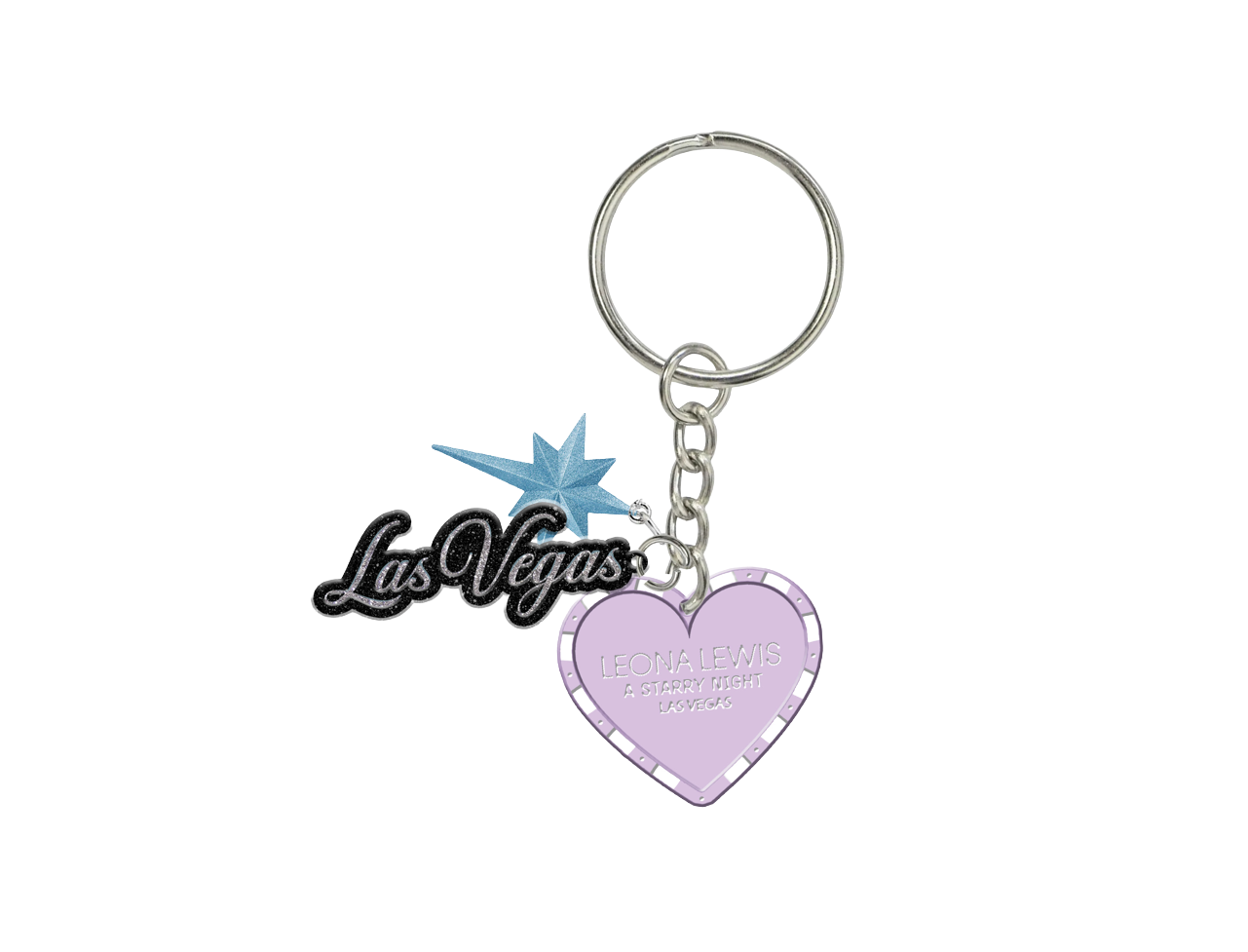 A silver metal keychain featuring a black and blue 'Las Vegas' script charm with a star, and a lavender purple heart charm engraved with 'Las Vegas Entertainment City'.
